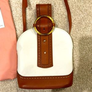White and tan/brown brogue Parisa Wang bracelet, crossbody bag